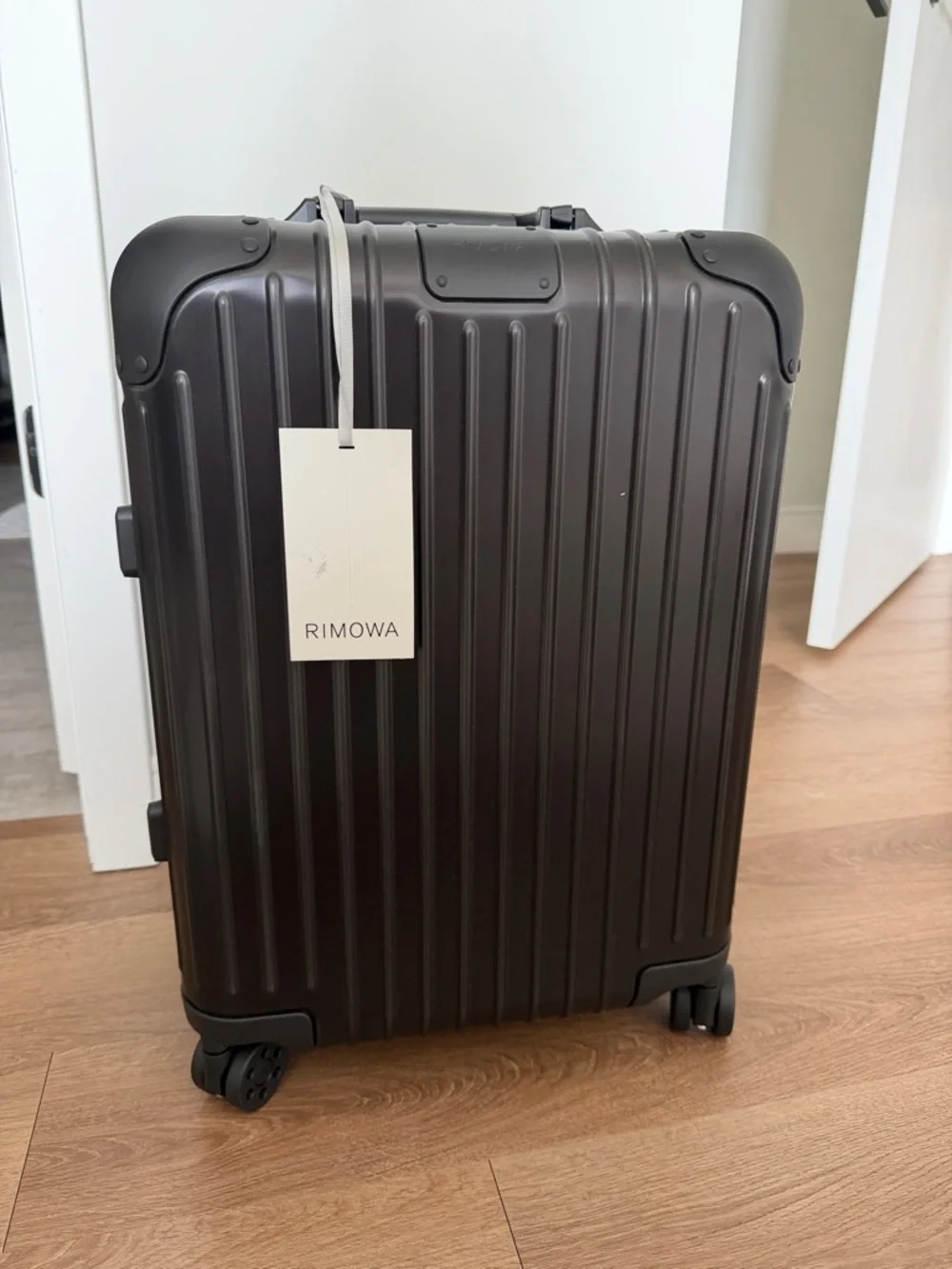 RIMOWA Black Hard-Shell Carry-On Spinner